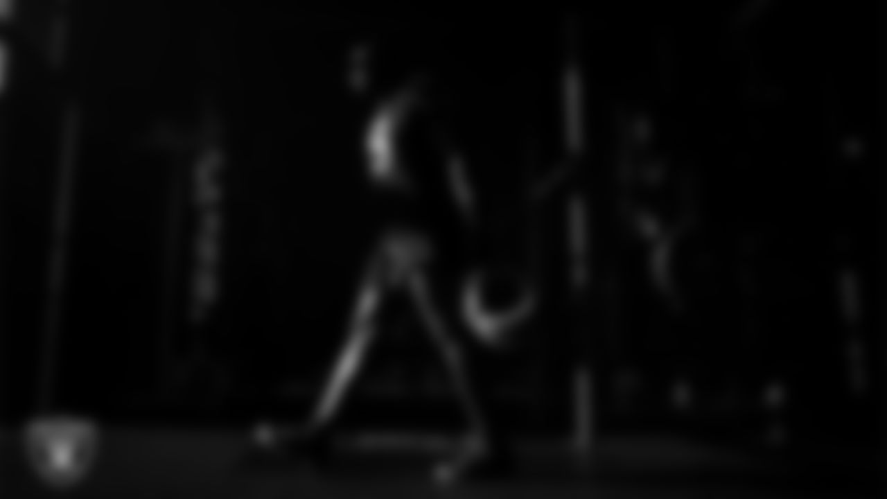 Las Vegas Raiders defensive end Tyree Wilson (9) walks out to the field for practice at Intermountain Health Performance Center.