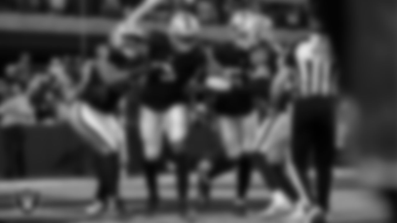 Las Vegas Raiders defensive end Tyree Wilson (9) celebrates with teammates after making a tackle for a safety during the regular season home game against the Kansas City Chiefs at Allegiant Stadium.