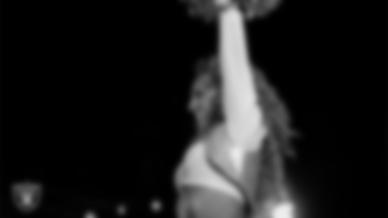 Raiderette Lexie performs with rapper and record producer Lil Jon during halftime at the Las Vegas Raiders regular season home game against the Los Angeles Chargers at Allegiant Stadium.