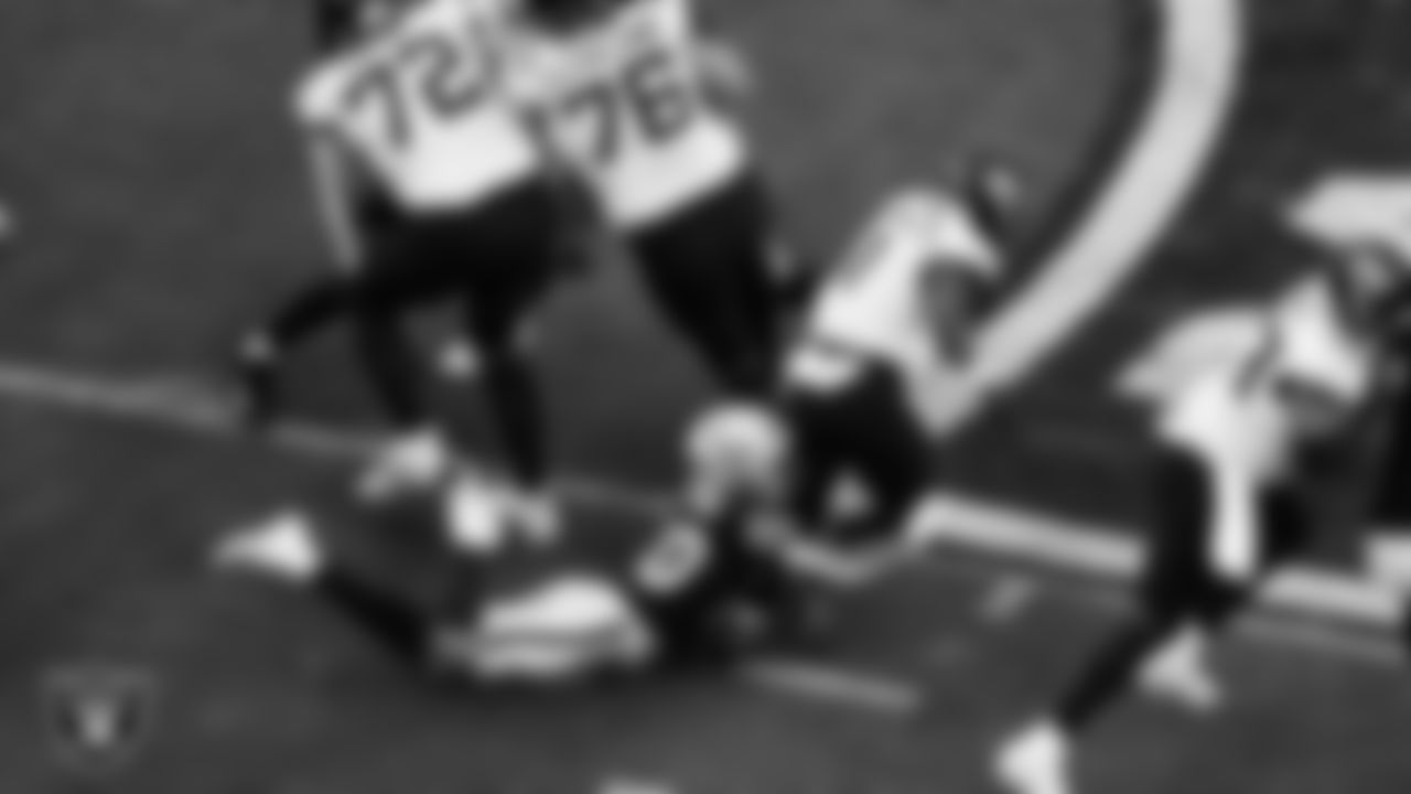 Las Vegas Raiders safety Isaiah Pola-Mao (20) makes a tackle during the regular season home game against the Jacksonville Jaguars at Allegiant Stadium.