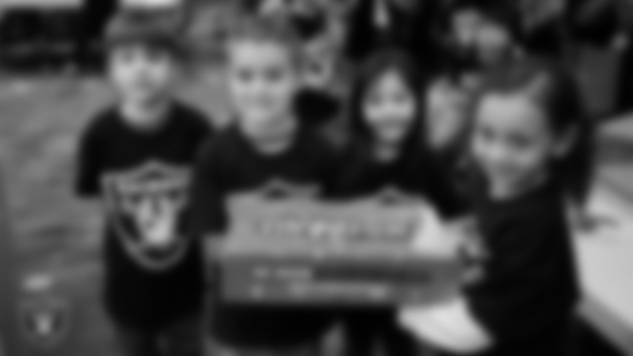 Students celebrate winning the Lil' Raiders School Challenge at Richard H. Bryan Elementary School.