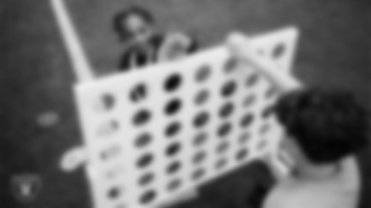 Students enjoy an activity during a Raiders Youth Holiday Party at Intermountain Health Performance Center.