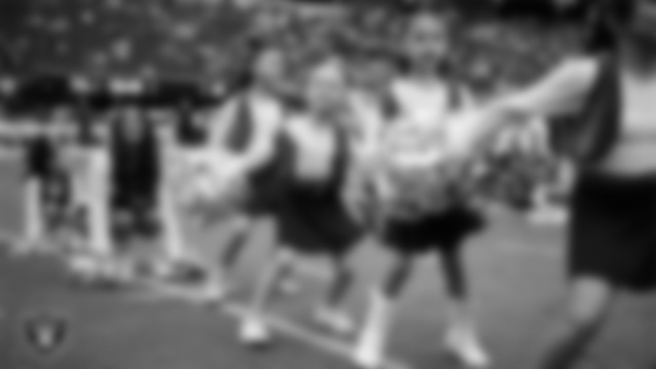 Junior Raiderettes perform on the field before the preseason home game against the San Francisco 49ers at Allegiant Stadium.