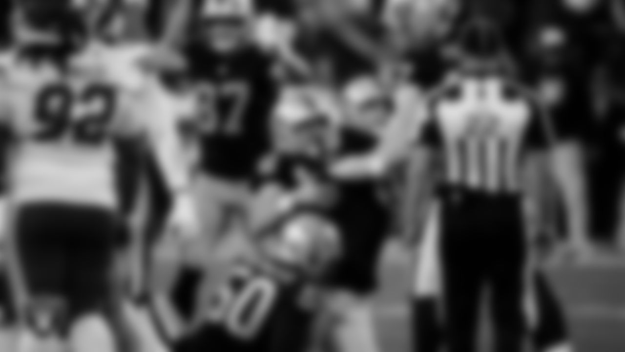 Las Vegas Raiders kicker Daniel Carlson (8) celebrates with teammates after kicking a 60-yard field goal during the regular season home game against the Kansas City Chiefs at Allegiant Stadium.