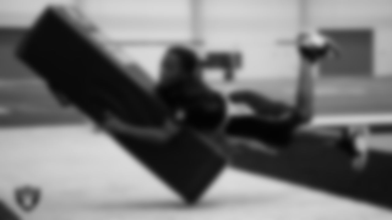 A student goes through a drill during a Raiders Junior Training Camp at Intermountain Health Performance Center.