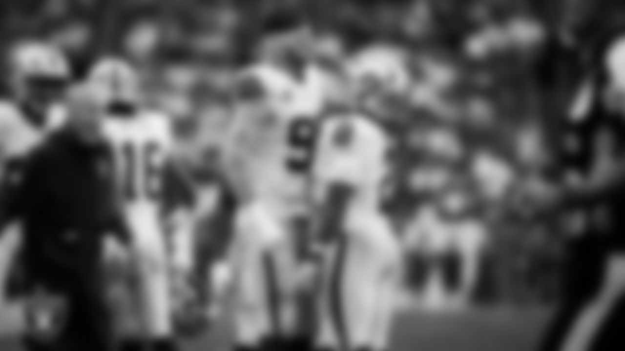 Las Vegas Raiders running back Ashton Jeanty (2) celebrates with defensive end Maxx Crosby (98) after rushing for a 3-yard touchdown during the regular season away game against the New England Patriots at Gillette Stadium.