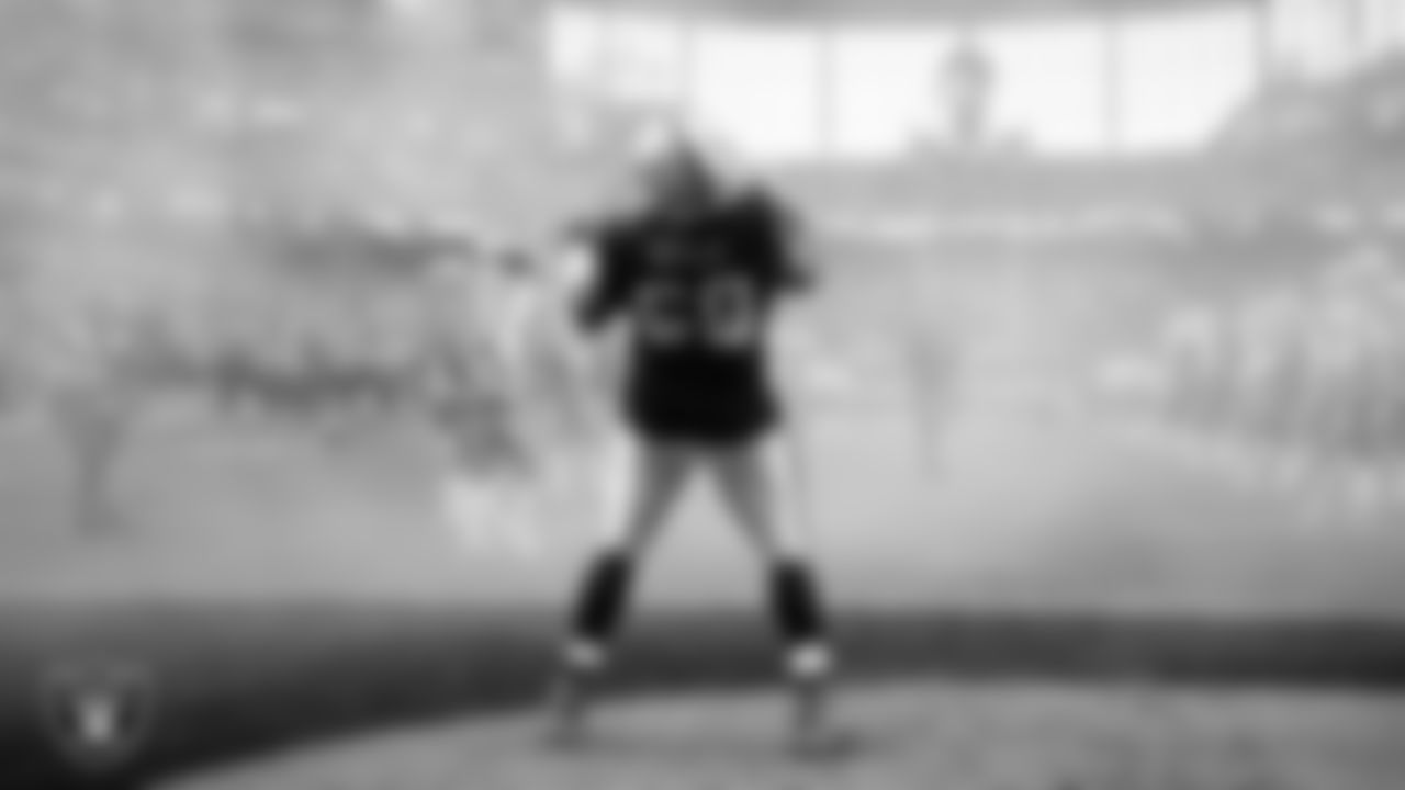 Las Vegas Raiders defensive tackle Adam Butler (69) is introduced onto the field before the regular season home game against the Denver Broncos at Allegiant Stadium.