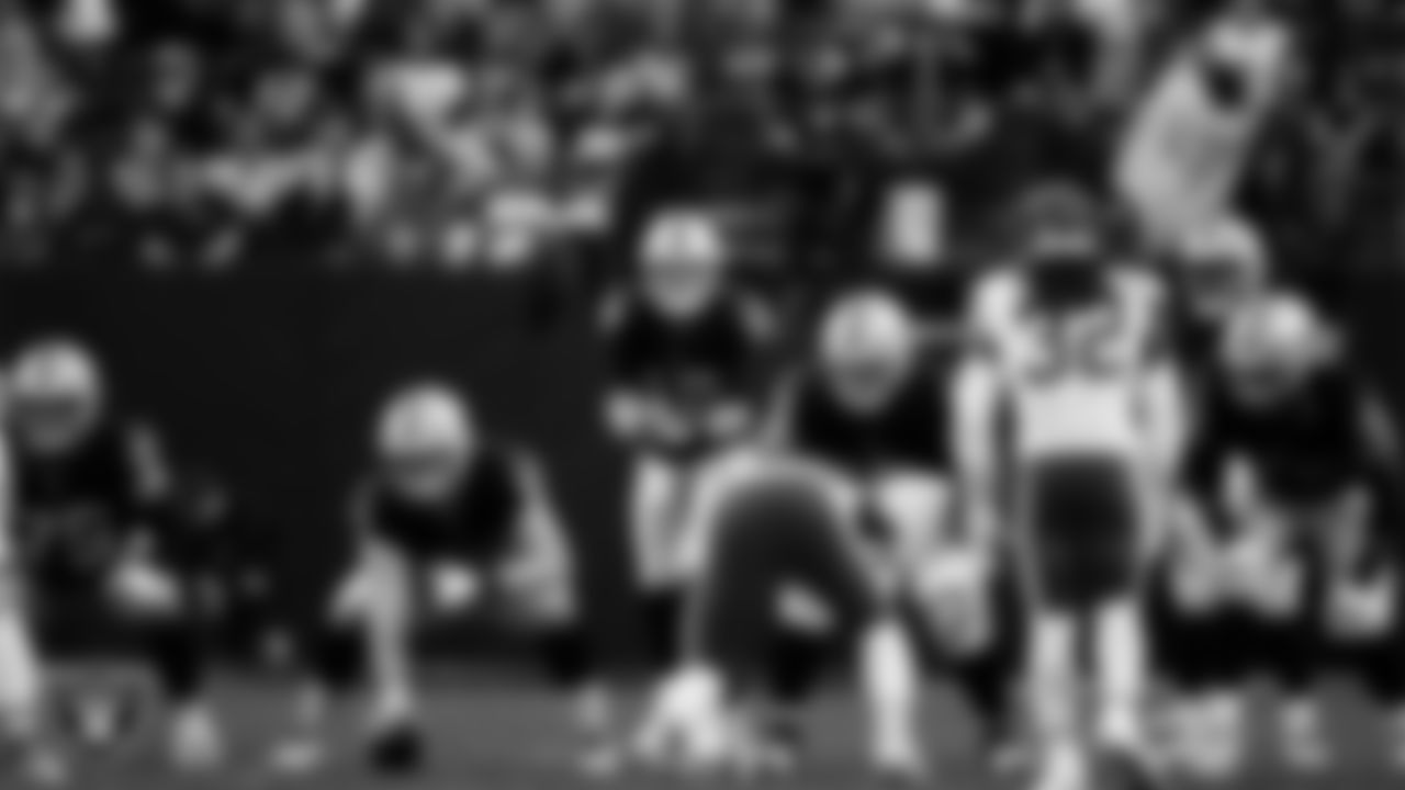 The Las Vegas Raiders offense lines up before the snap during the regular season home game against the Kansas City Chiefs at Allegiant Stadium.