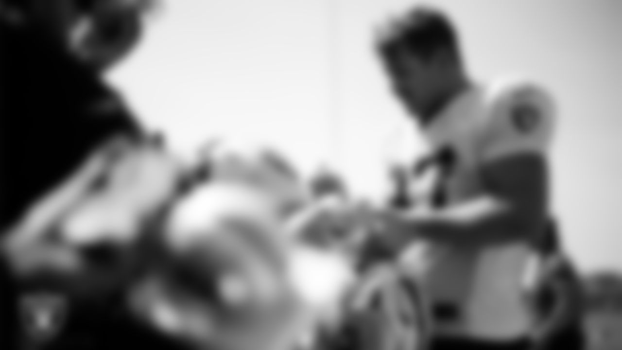 Las Vegas Raiders tight end Michael Mayer (87) signs autographs after a joint practice with the San Francisco 49ers at 2025 Training Camp at Intermountain Health Performance Center.