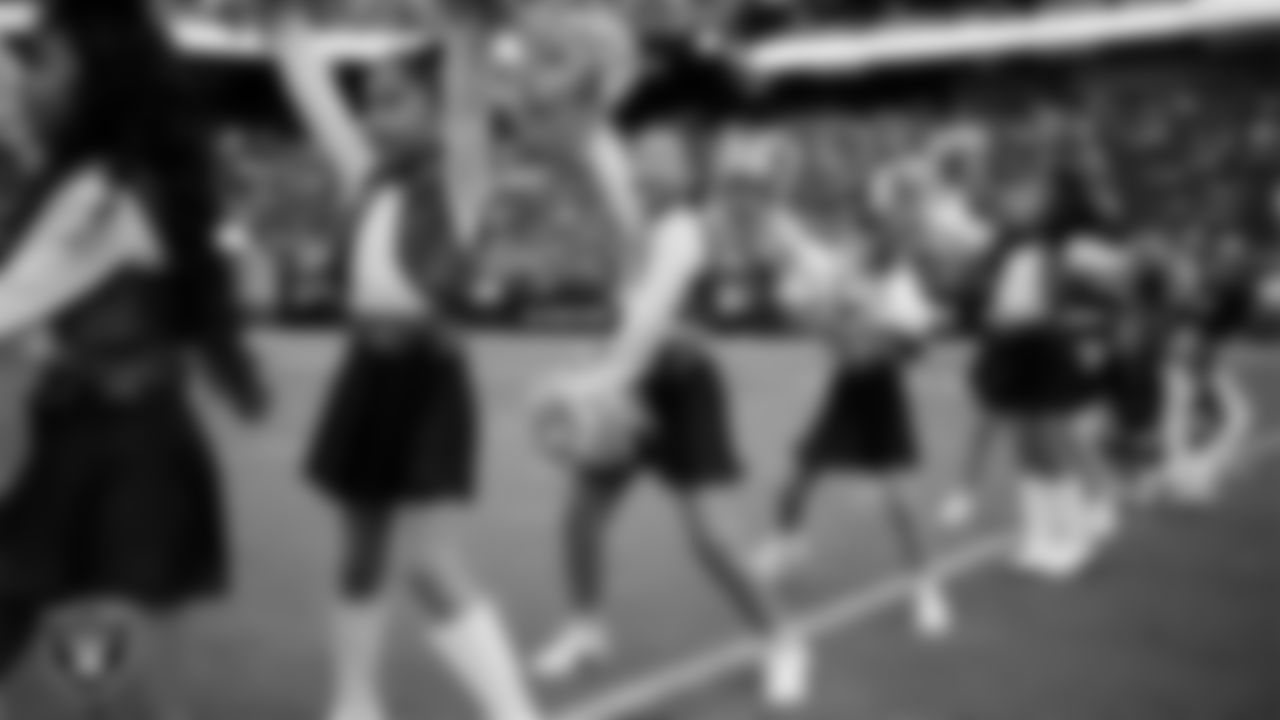 Junior Raiderettes perform on the field before the preseason home game against the San Francisco 49ers at Allegiant Stadium.