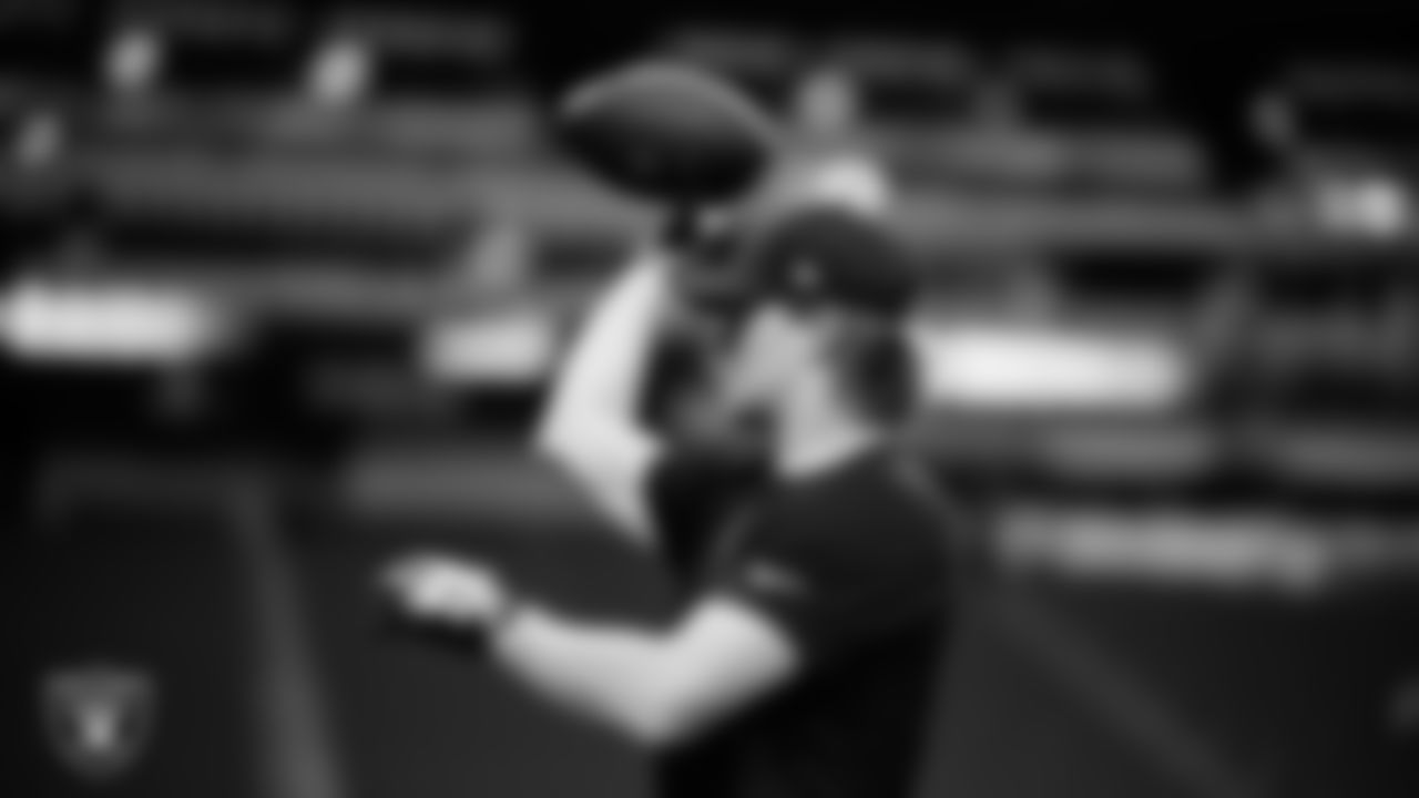 Las Vegas Raiders quarterback Kenny Pickett (15) warming up before the regular season home game against the Denver Broncos at Allegiant Stadium.