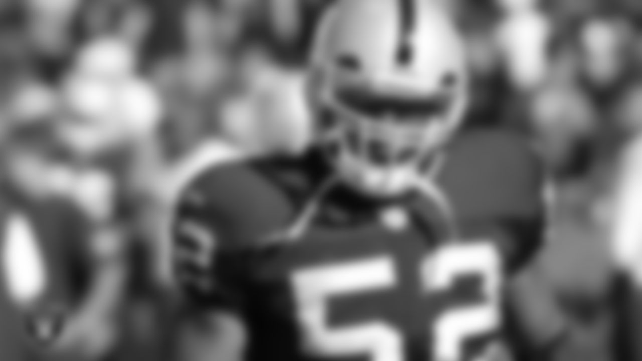 Oakland Raiders linebacker Kirk Morrison (52) warming up before the regular season home game against the Kansas City Chiefs at McAfee Stadium, Sunday, September 18, 2005, in Oakland, Calif.