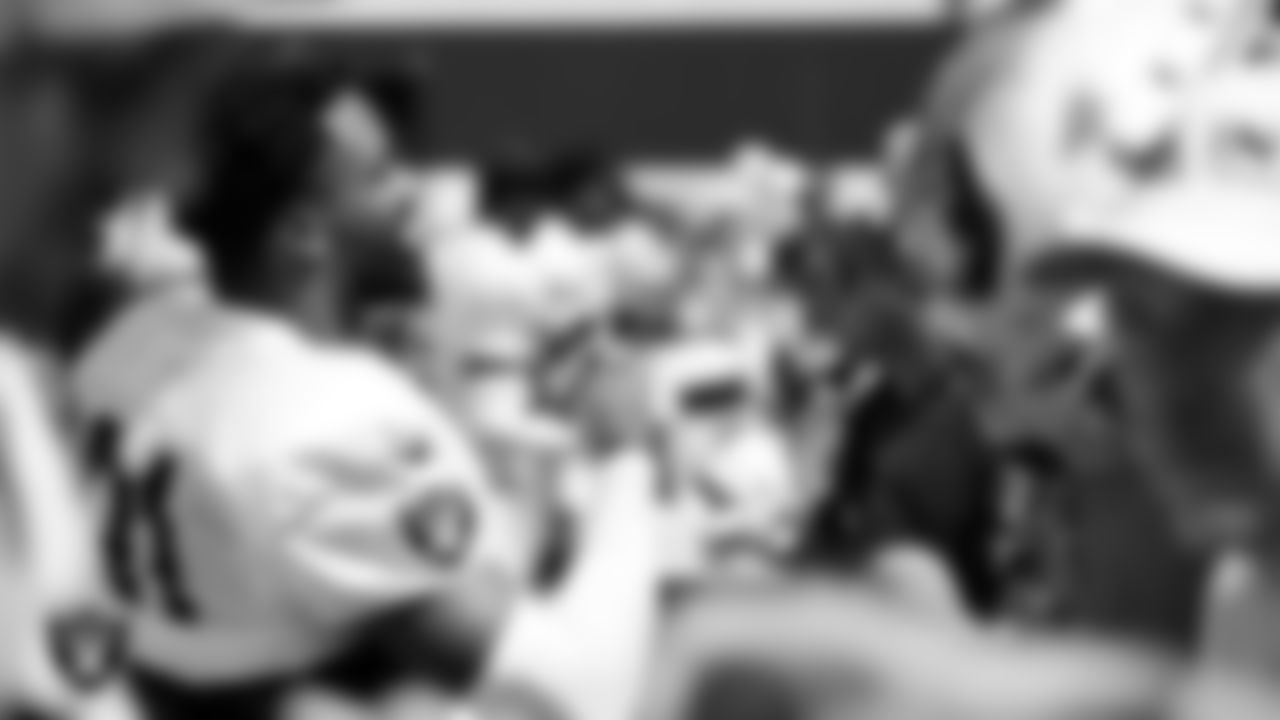 Las Vegas Raiders running back Raheem Mostert (31) signs autographs after a joint practice with the San Francisco 49ers at 2025 Training Camp at Intermountain Health Performance Center.
