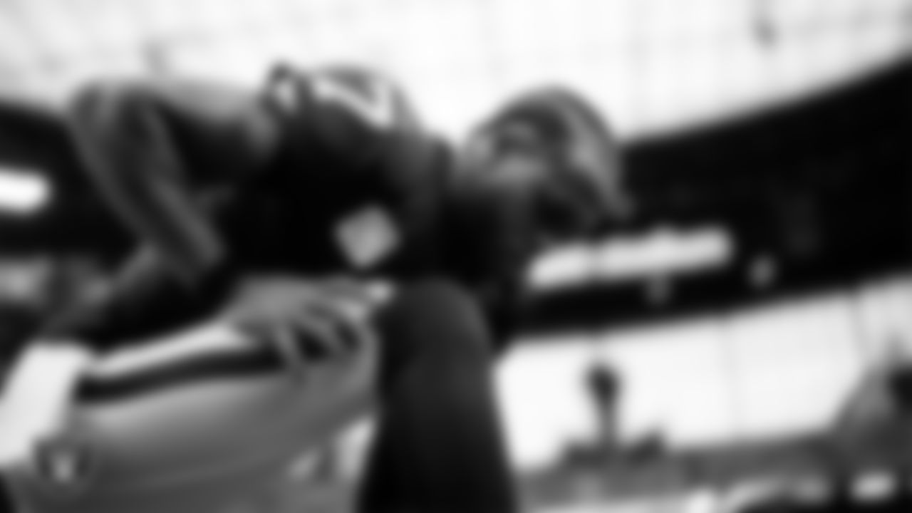 Las Vegas Raiders quarterback Geno Smith (7) warming up before the regular season home game against the Denver Broncos at Allegiant Stadium.