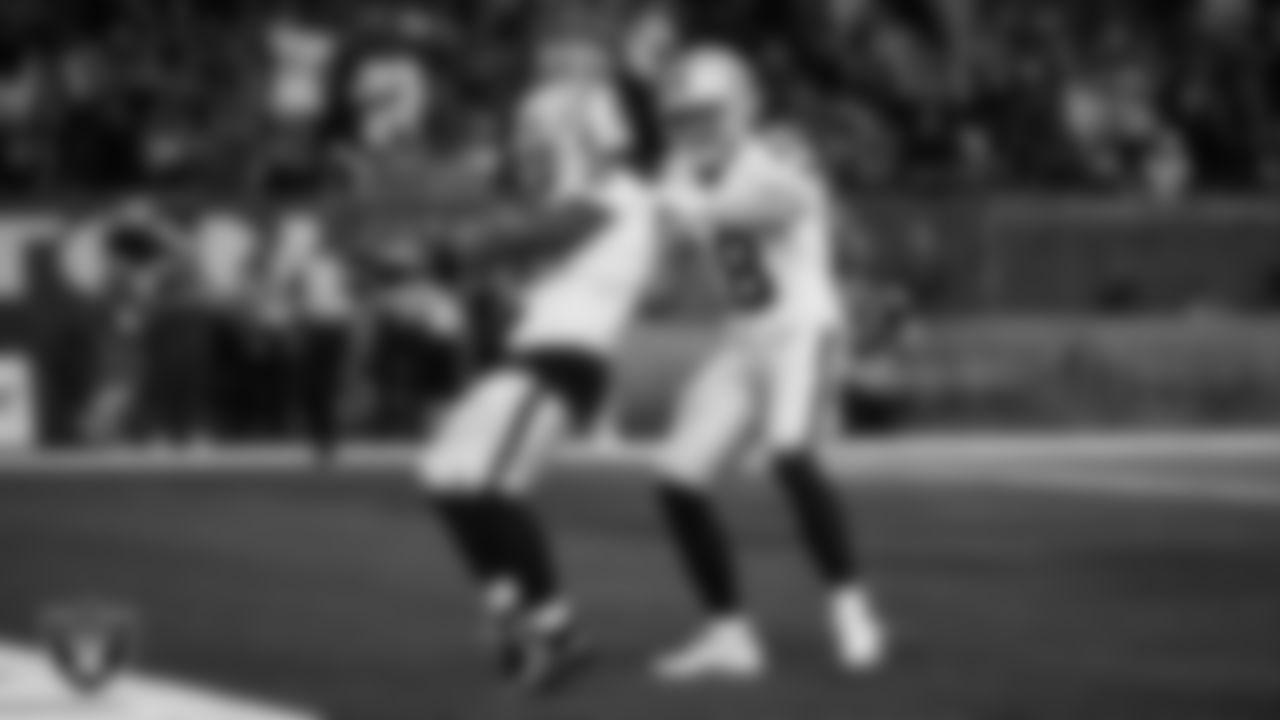 Las Vegas Raiders running back Ashton Jeanty (2) celebrates with wide receiver Jack Bech (18) after making a 60-yard touchdown catch during the regular season away game against the Houston Texans at NRG Stadium.