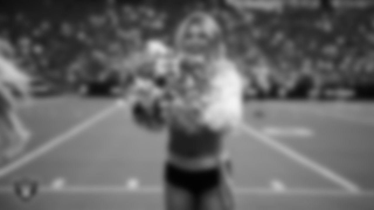 Raiderette Isabella performs on the sidelines during a 2025 Training Camp mock game at Allegiant Stadium.
