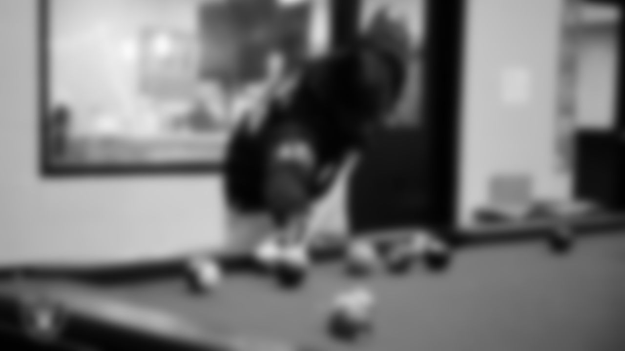 Las Vegas Raiders wide receiver Phillip Dorsett II (13) shoots pool with members of the Boys and Girls Club at the Lied Memorial Boys & Girls Clubs of Southern Nevada.