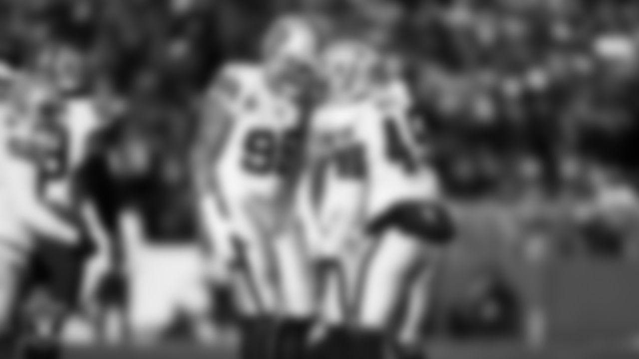 Las Vegas Raiders linebacker Devin White (45) celebrates with defensive end Maxx Crosby (98) after making a tackle during the regular season away game against the Philadelphia Eagles at Lincoln Financial Field.