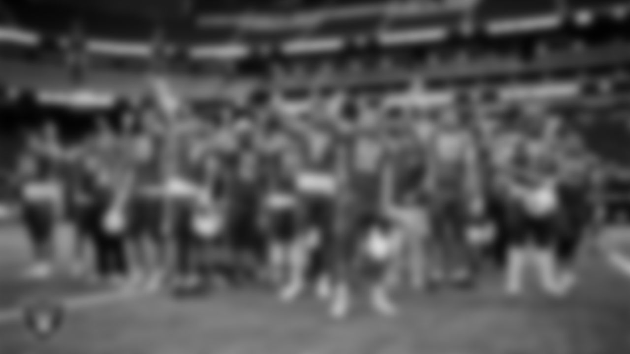 The Needles High School football team celebrates after defeating Pershing County High School in the NIAA 2A Division State Championship game at Allegiant Stadium.