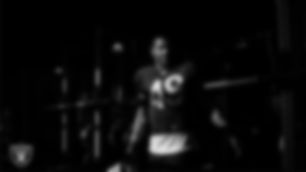 Las Vegas Raiders defensive end Charles Snowden (49) walks out to the field for practice at Intermountain Health Performance Center.