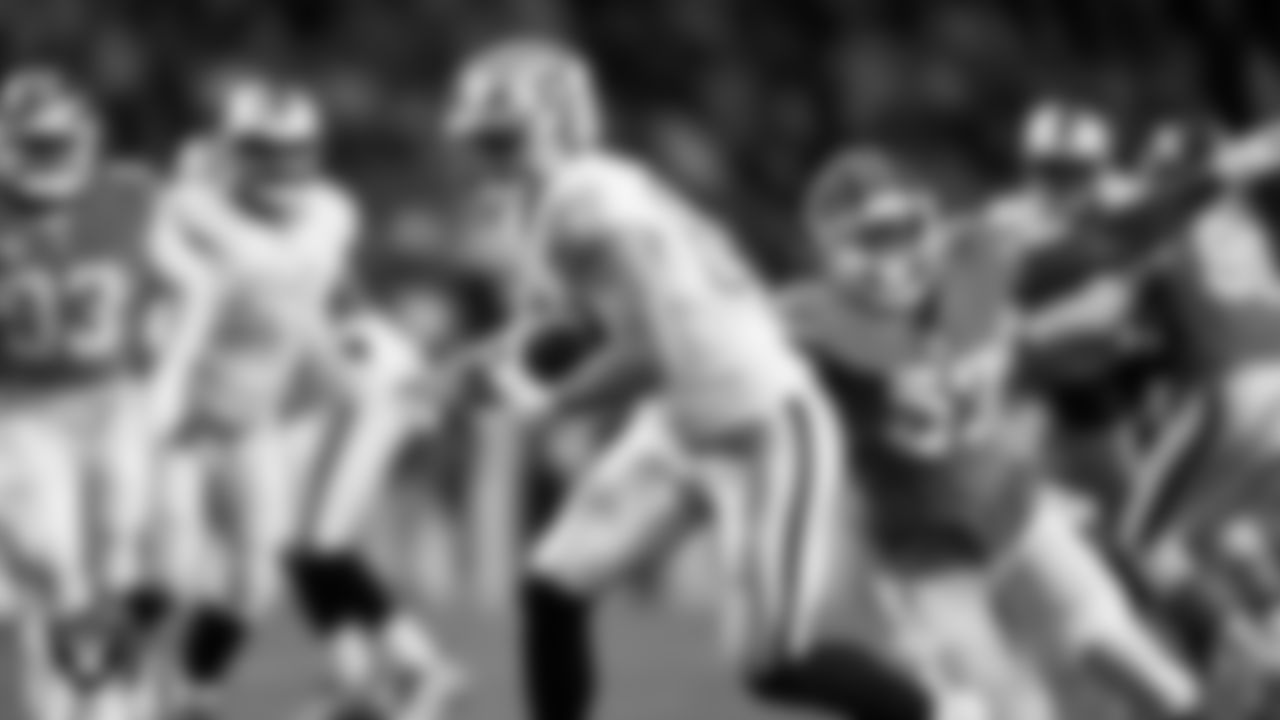 Las Vegas Raiders tight end Michael Mayer (87) runs after making a catch during the regular season away game against the Denver Broncos at Empower Field at Mile High.