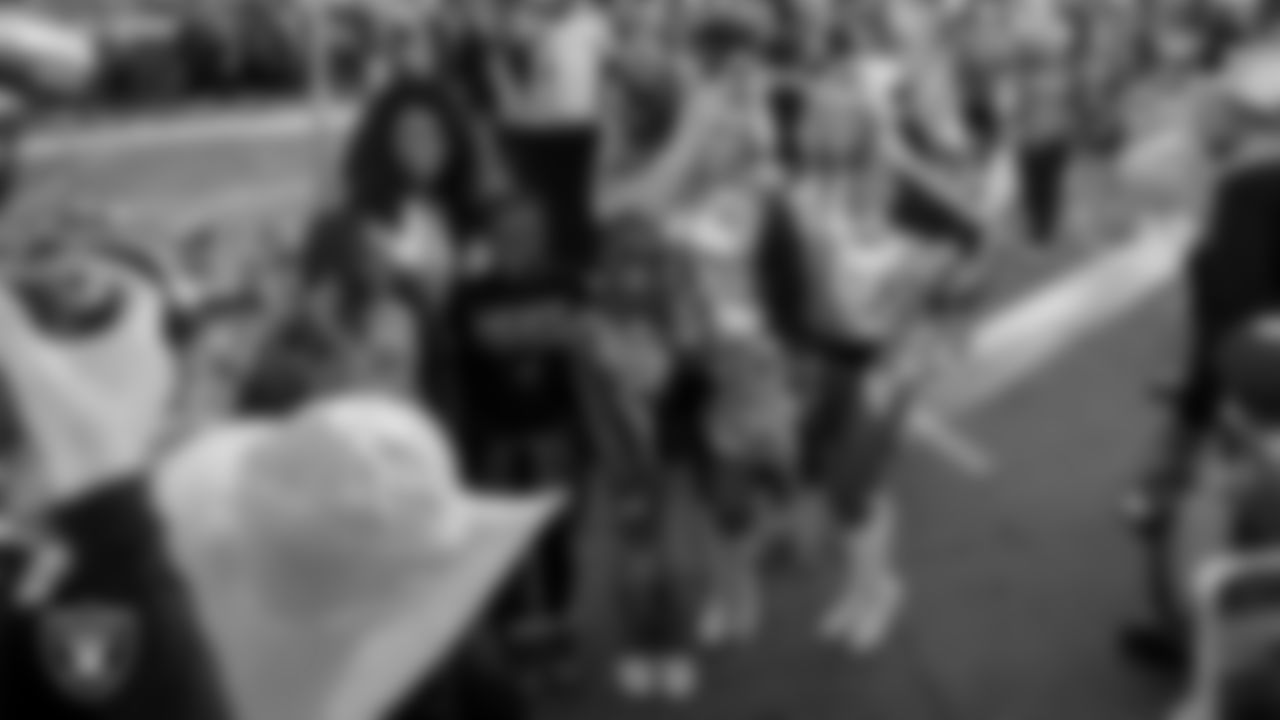 Raiderettes Shayla, Devyn and Jessica pose for a photo with attendees during the American Cancer Society Making Strides Against Breast Cancer fundraiser at Red Rock Resort.