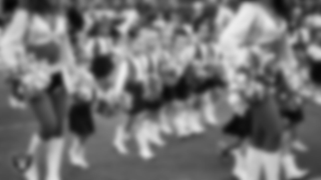 Junior Raiderettes enter the field for their performance on the field before the preseason home game against the San Francisco 49ers at Allegiant Stadium.
