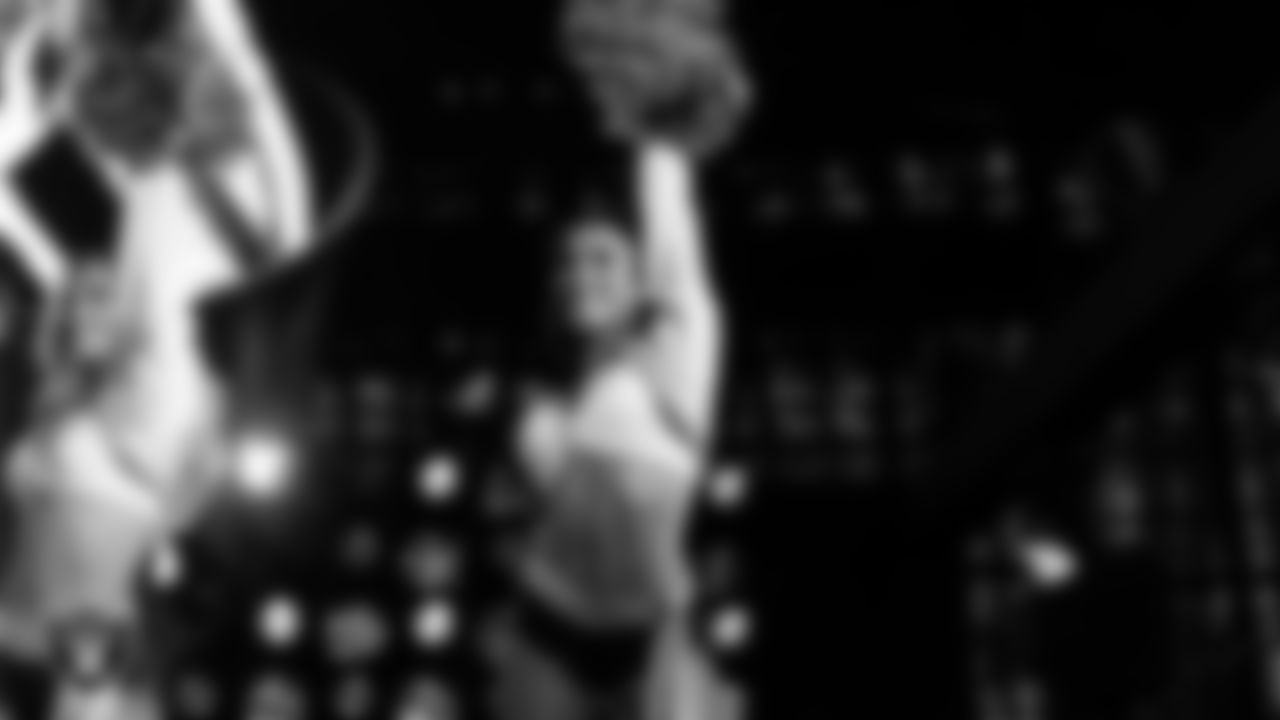 Raiderette Kylie performs with rapper and record producer Lil Jon during halftime at the regular season home game against the Los Angeles Chargers at Allegiant Stadium.