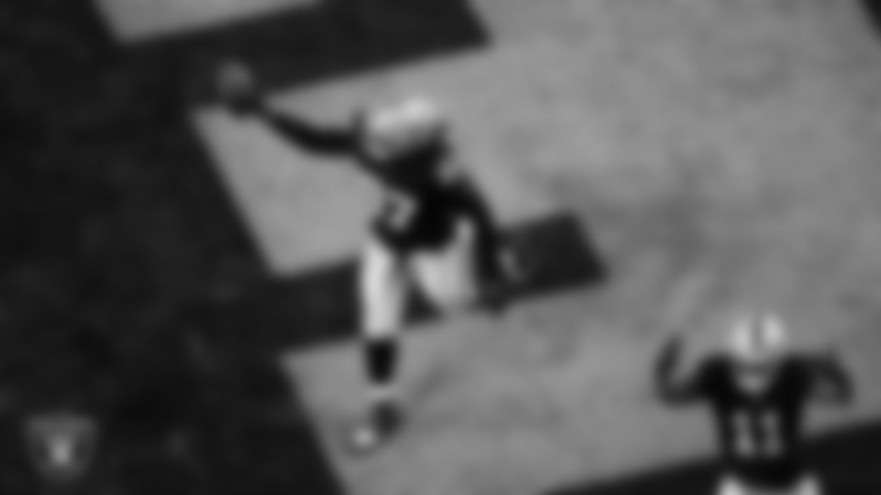 Las Vegas Raiders defensive tackle Tonka Hemingway (97) celebrates after recovering a fumble during the regular season home game against the Dallas Cowboys at Allegiant Stadium.