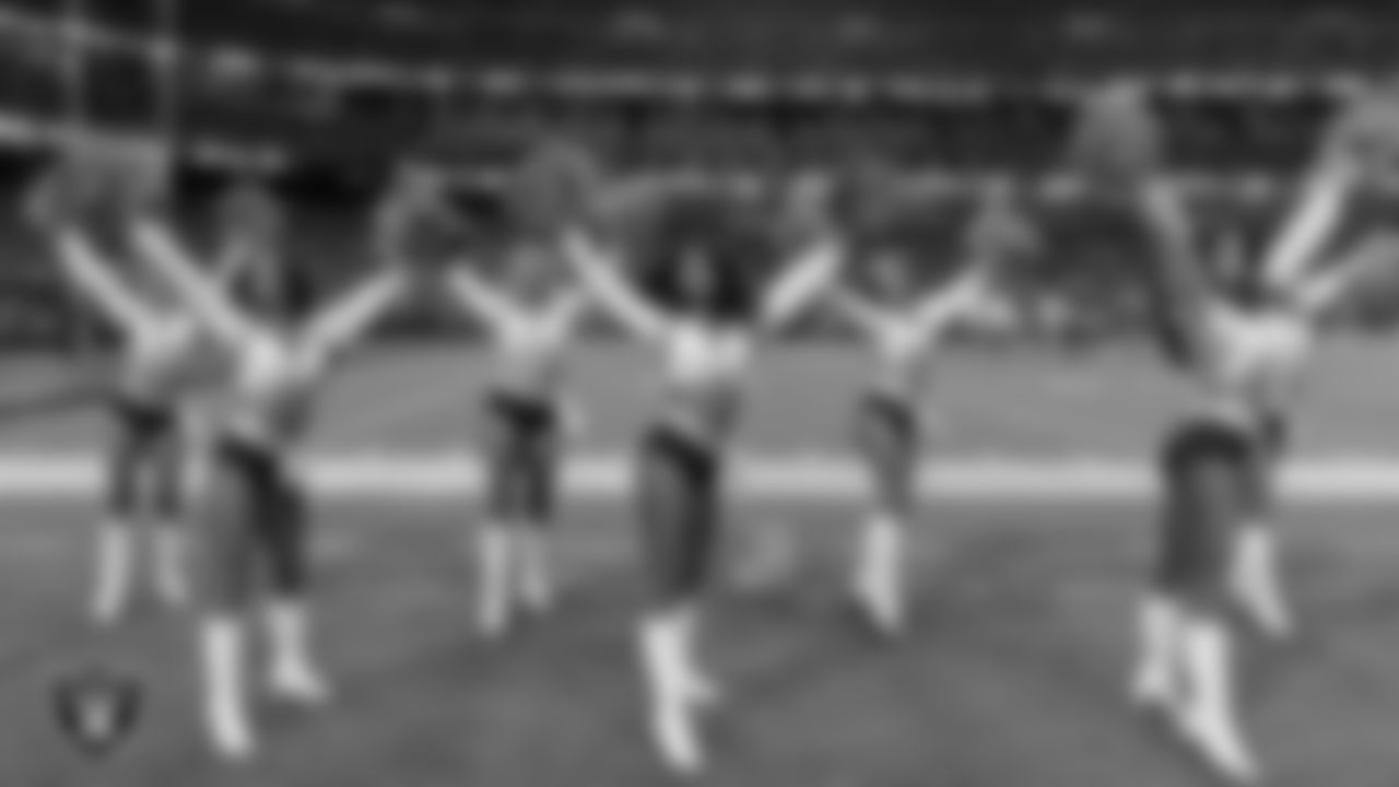 Line 4 of the Raiderettes performs on the sidelines during the regular season home game against the Los Angeles Chargers at Allegiant Stadium.