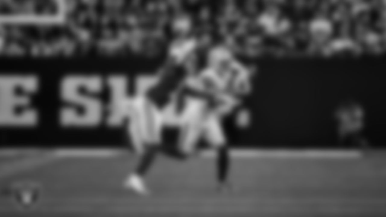 Las Vegas Raiders safety Isaiah Pola-Mao (20) breaks up a pass during the regular season away game against the Indianapolis Colts at Lucas Oil Stadium.