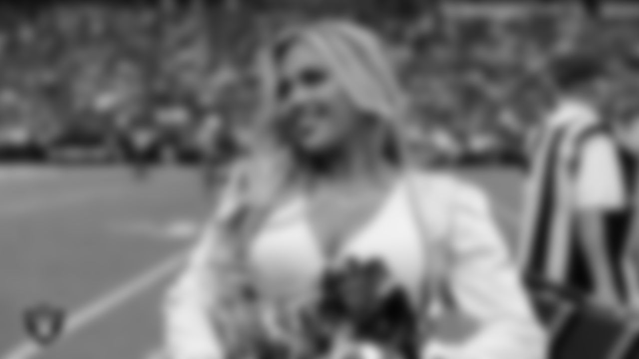 Raiderette Devyn on the sidelines during the preseason home game against the San Francisco 49ers at Allegiant Stadium.