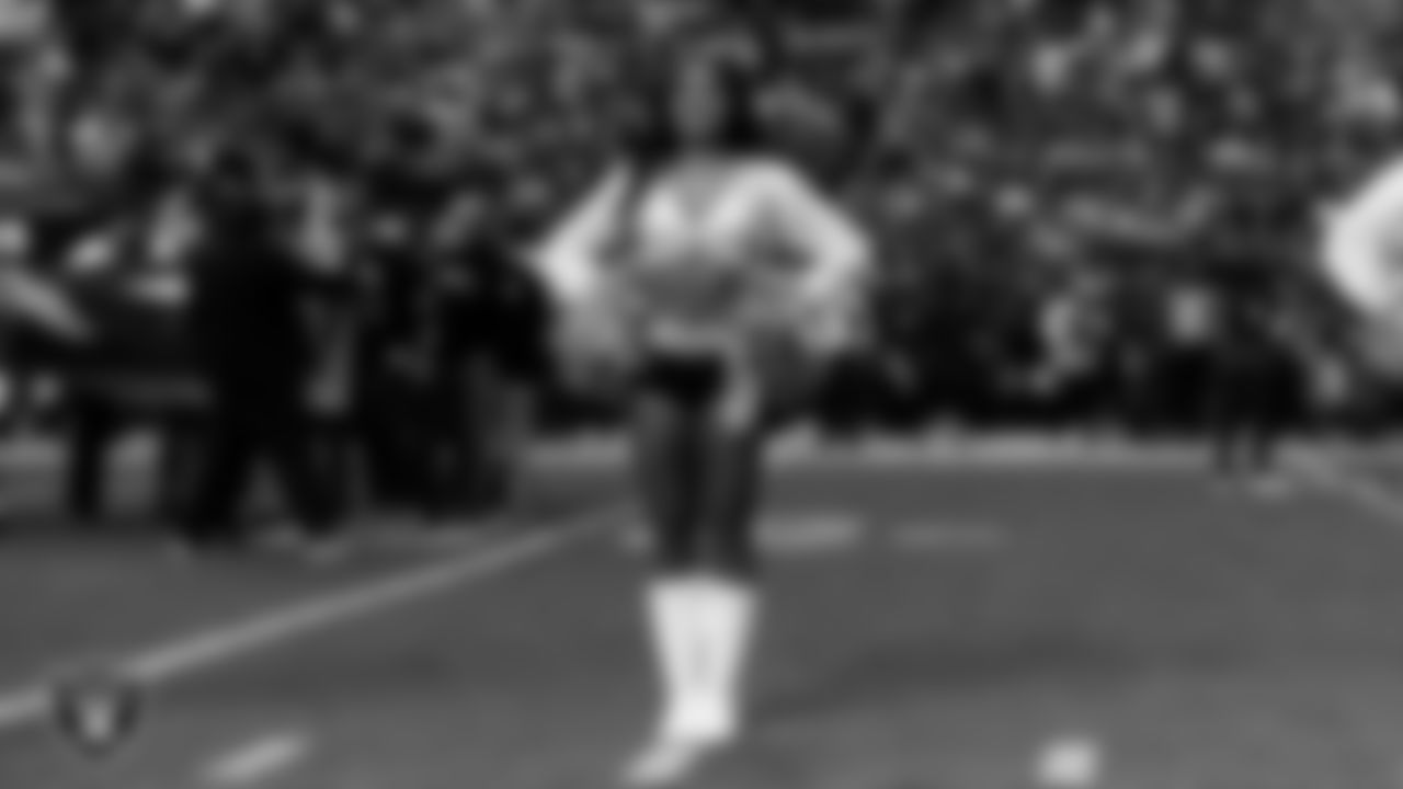 Raiderette Sloane during player introductions before the regular season home game against the Denver Broncos at Allegiant Stadium.