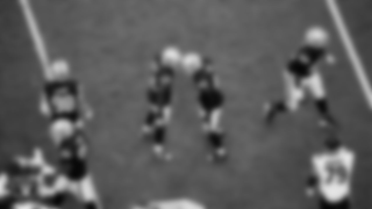 Las Vegas Raiders linebacker Elandon Roberts (52) celebrates with linebacker Devin White (45) after making a tackle during the regular season home game against the Chicago Bears at Allegiant Stadium.