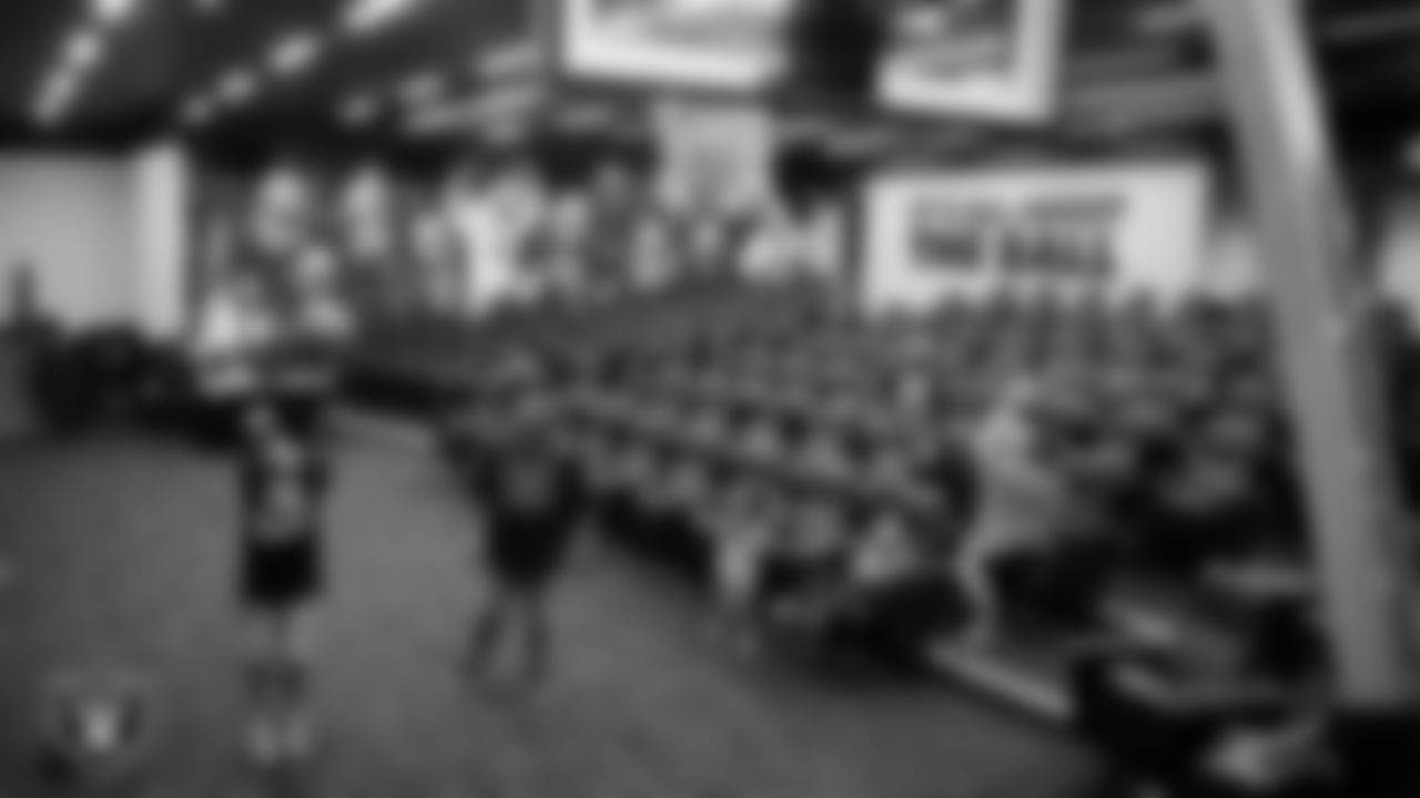 Christopher Arias from Make-A-Wish takes a shot in the team room during a visit to Intermountain Health Performance Center.