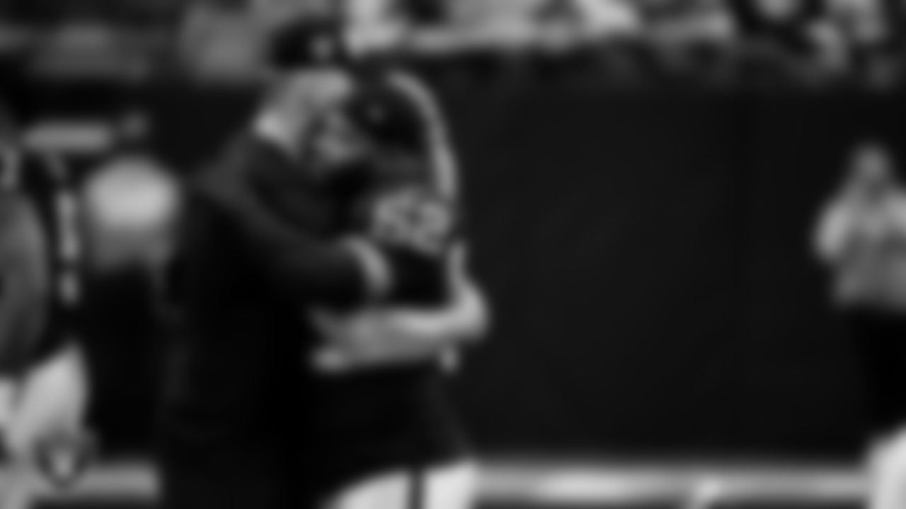 Las Vegas Raiders defensive end Maxx Crosby (98) and linebacker Elandon Roberts (52) before the regular season home game against the Kansas City Chiefs at Allegiant Stadium.