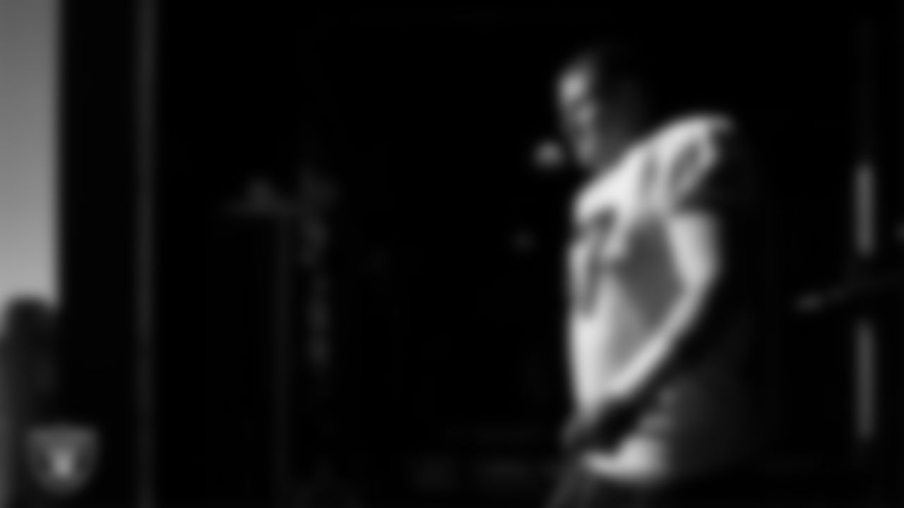 Las Vegas Raiders center Will Putnam (67) walks out to the field for practice at Intermountain Health Performance Center.