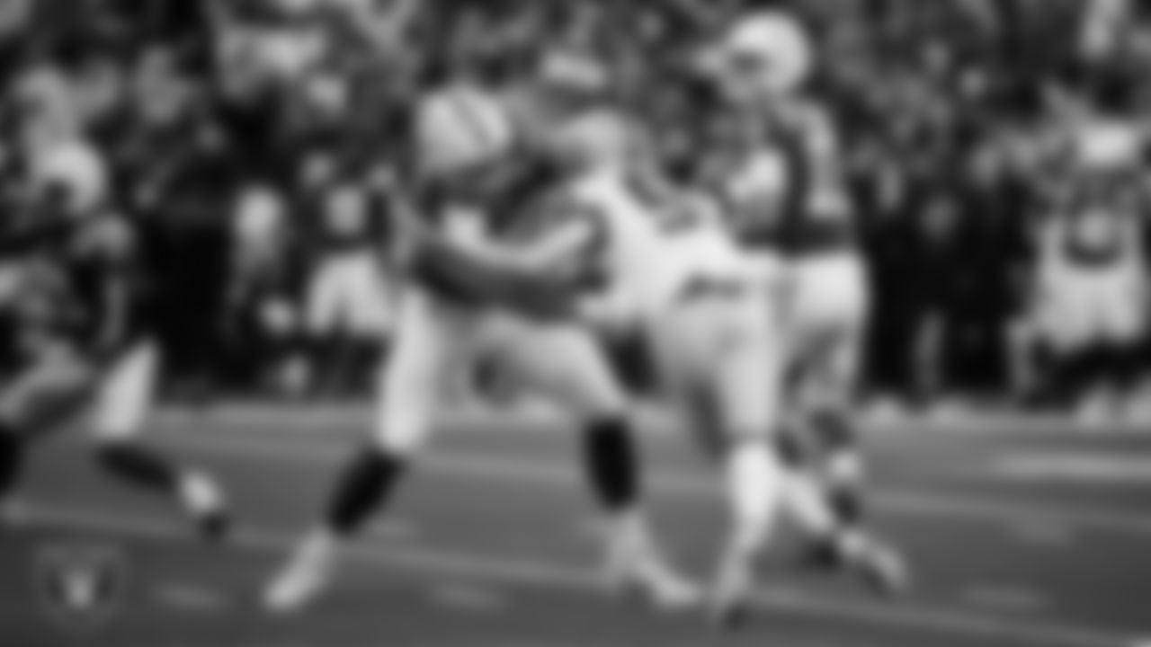 Las Vegas Raiders defensive end Malcolm Koonce (51) pressures the quarterback during the regular season away game against the Indianapolis Colts at Lucas Oil Stadium.