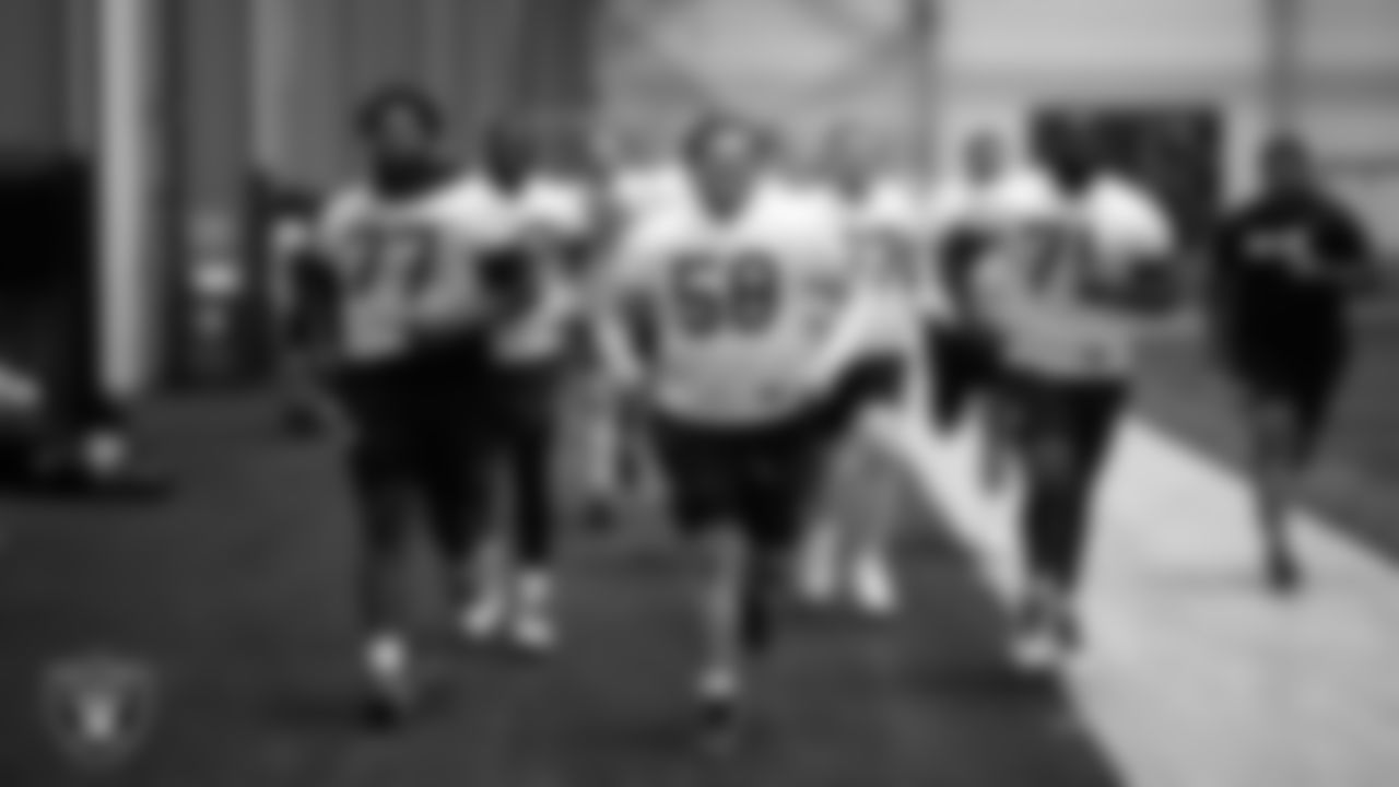 Las Vegas Raiders tackle Thayer Munford Jr. (77), guard Jackson Powers-Johnson (58) and tackle DJ Glaze (71) at a workout during phase two of the offseason program at Intermountain Health Performance Center.