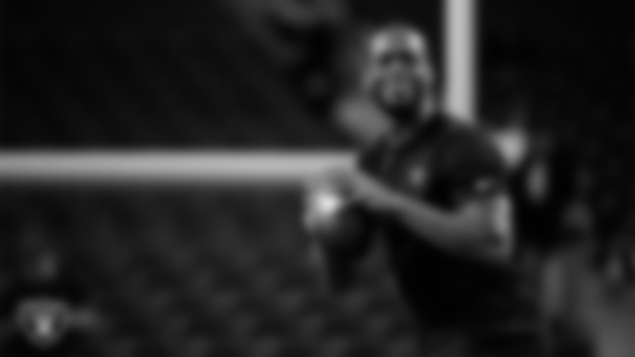 Las Vegas Raiders quarterback Geno Smith (7) warming up before the regular season home game against the Dallas Cowboys at Allegiant Stadium.