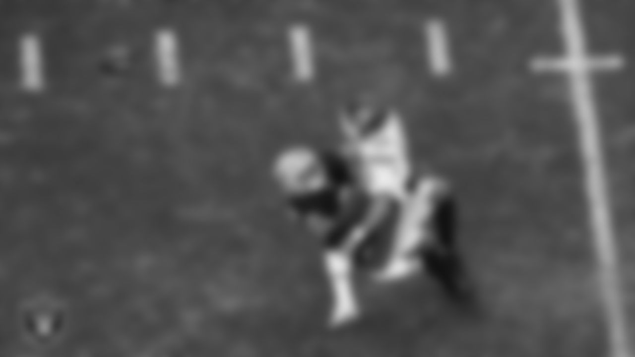 Las Vegas Raiders defensive end Tyree Wilson (9) forces a fumble during the regular season home game against the Kansas City Chiefs at Allegiant Stadium.