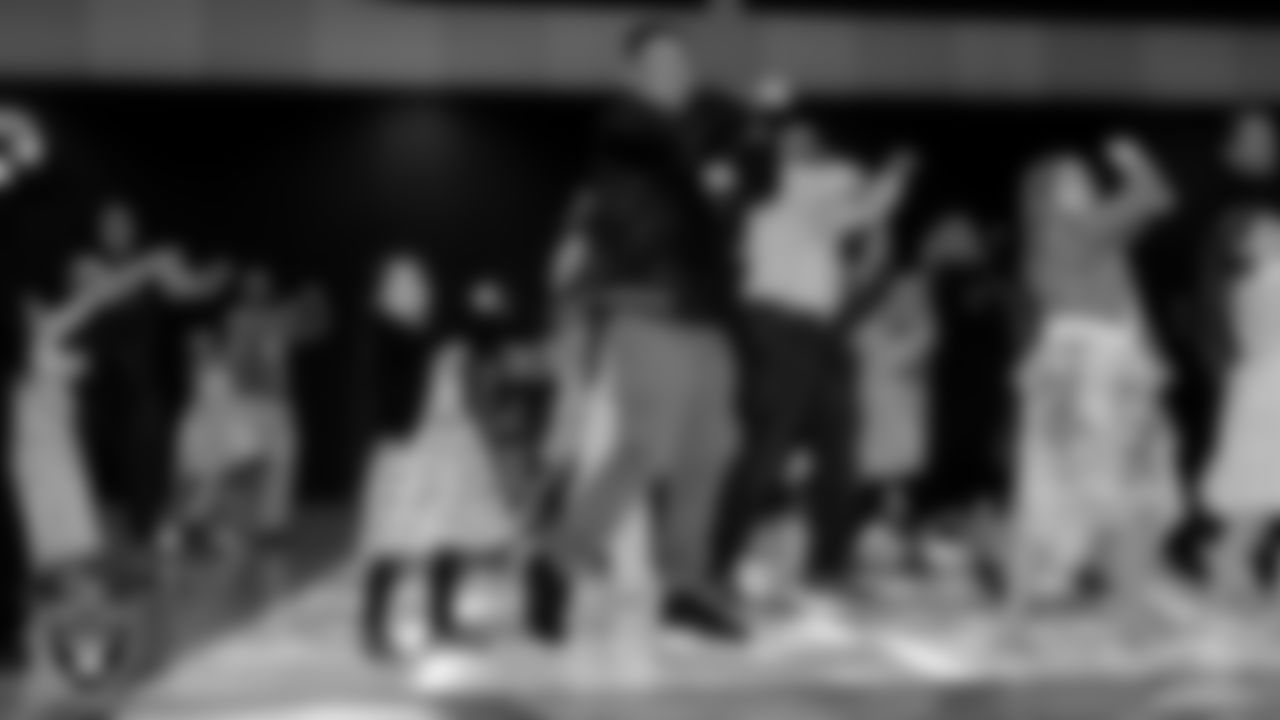 Attendees learn a dance during the Valentine's Day Dance at The Studio.