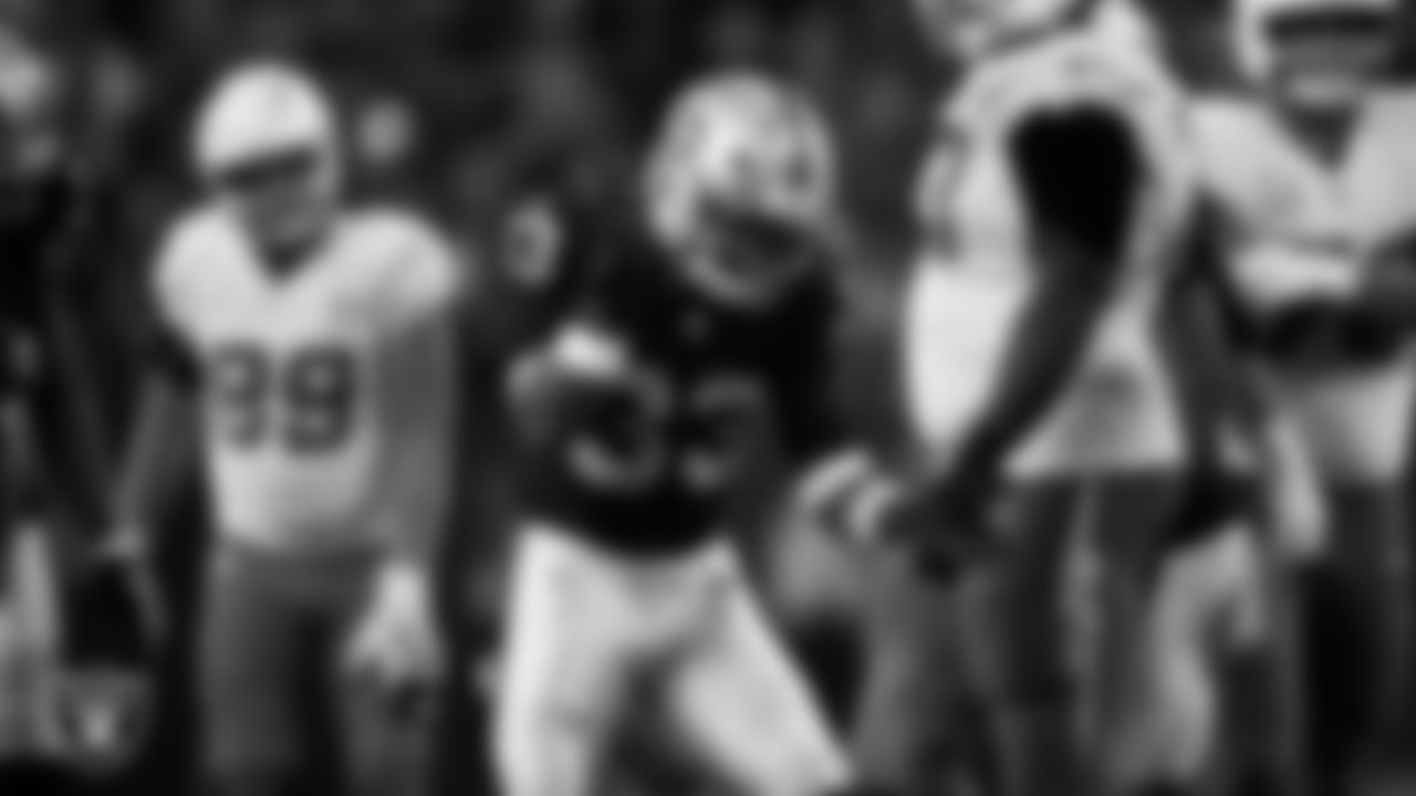 Las Vegas Raiders linebacker Jamal Adams (33) celebrates on the field during the regular season home game against the Los Angeles Chargers at Allegiant Stadium.