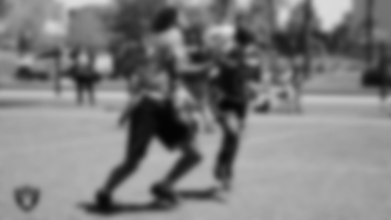 Athletes compete in a Silver and Black Flag Football game at Bill and Lillie Heinrich YMCA.