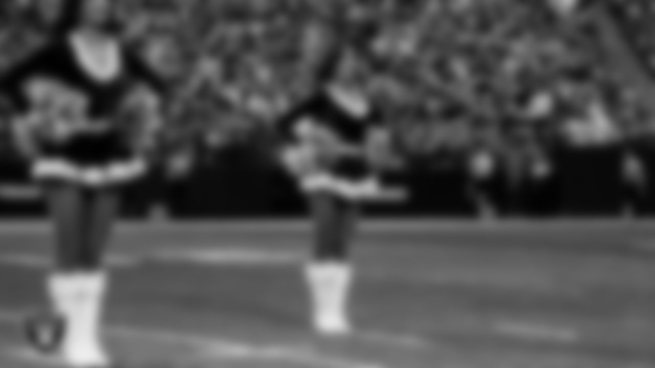 Raiderette Tatiana during player introductions before the regular season home game against the New York Giants at Allegiant Stadium.
