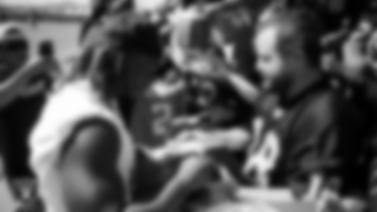 Las Vegas Raiders running back Ashton Jeanty (2) signs autographs after a 2025 Training Camp practice at Intermountain Health Performance Center.