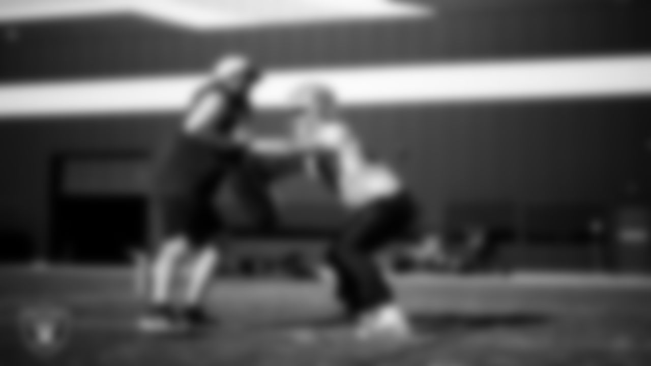 Las Vegas Raiders tight ends coach Luke Steckel and tight end Michael Mayer (87) during practice at Intermountain Health Performance Center.