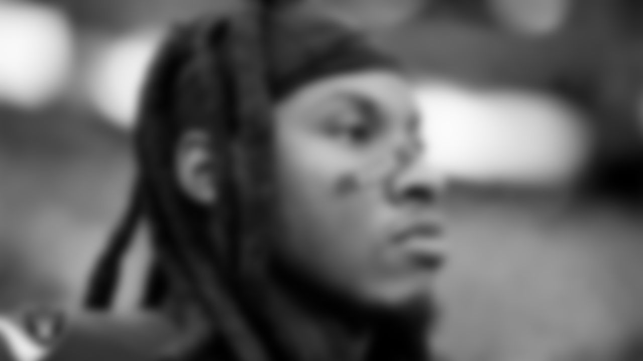 Las Vegas Raiders safety Lonnie Johnson Jr. (32) during the national anthem before the regular season home game against the Denver Broncos at Allegiant Stadium.