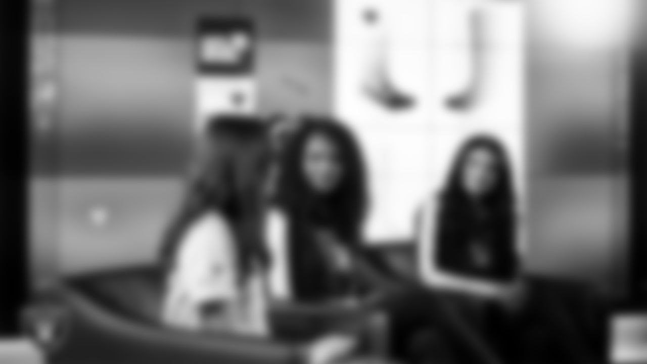 Raiderettes Shayla and Kylee meet with representatives from Hope Means Nevada and designers to design custom boots for the NFL's My Cause My Cleats initiative in Cox Studios at Intermountain Health Performance Center.