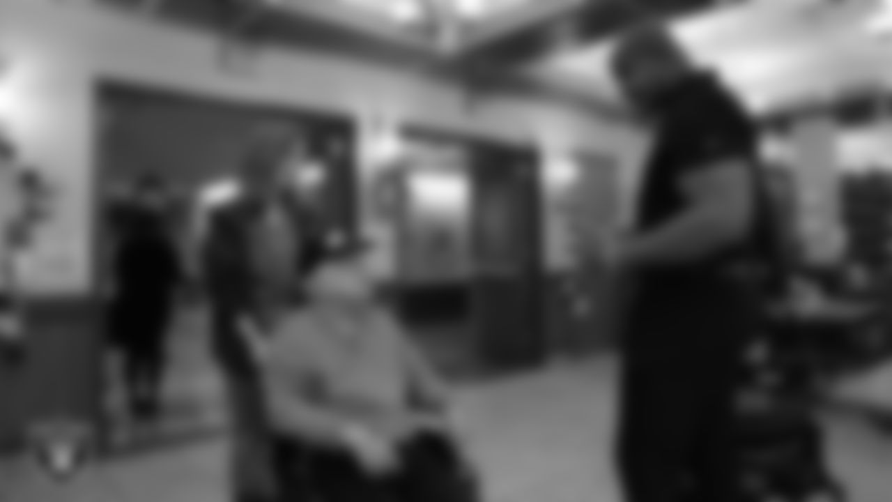 Las Vegas Raiders alumnus Grant Irons speaks to a veteran during the annual Cox Salute to Service Tailgate at Southern Nevada State Veterans Home.